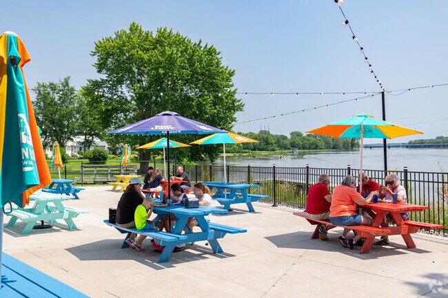 Rock Riverfront residents can enjoy a casual meal in the sun at Riverfront Grill.