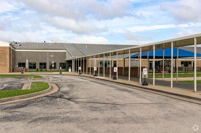 Holcomb Elementary has a student to teacher ratio of 21 to 1 and an A- rating on Niche.com