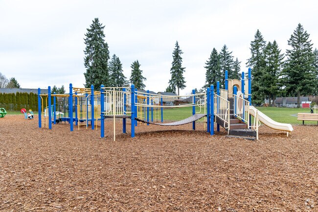 A bright blue and yellow play structure at Silver Star Elementary School in Vancouver, WA.