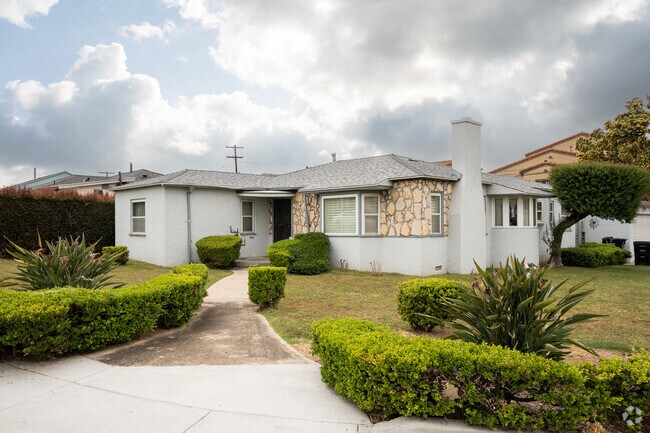 Vintage modern home with stone siding features in Southcrest San Diego.
