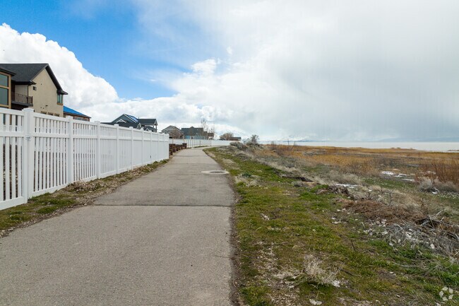Walking path at Utah Lake near Geneva neighborhood, Utah.