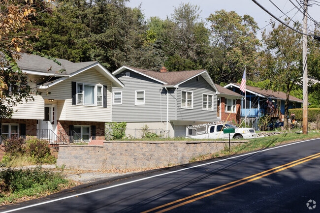 A variety of housing styles are found in Vernon Township, NJ like this street of split levels.