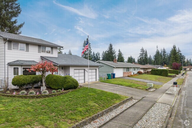 Smokey Point features many different styles of homes with garages and porches.