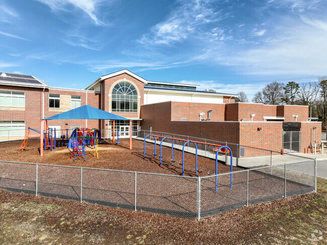 Kids enjoy the playground at Royal Oaks Elementary School in Kannapolis.