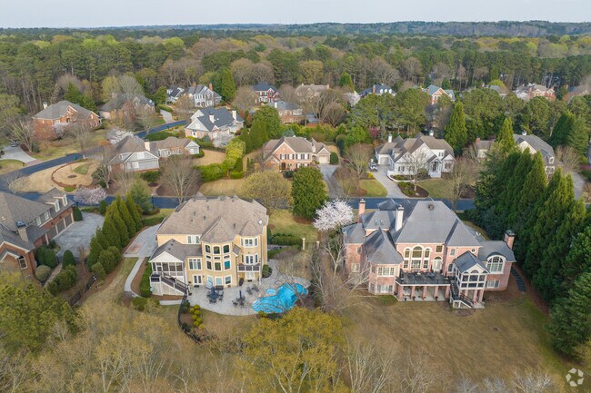 Large homes with spacious lots can be found across the neighborhood of John's Creek's Warsaw.