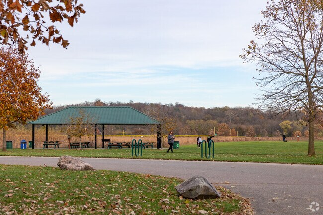 Heritage Park offers shaded paths for afternoon walks in Harrison.