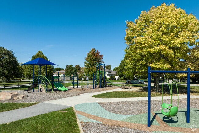 The play set at Century Park near Hickory Oaks is colorful and ready for fun.