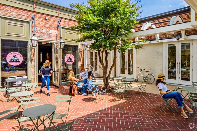 Local Wyngate residents enjoy the outdoor dining options at the Wildwood Shopping Center.