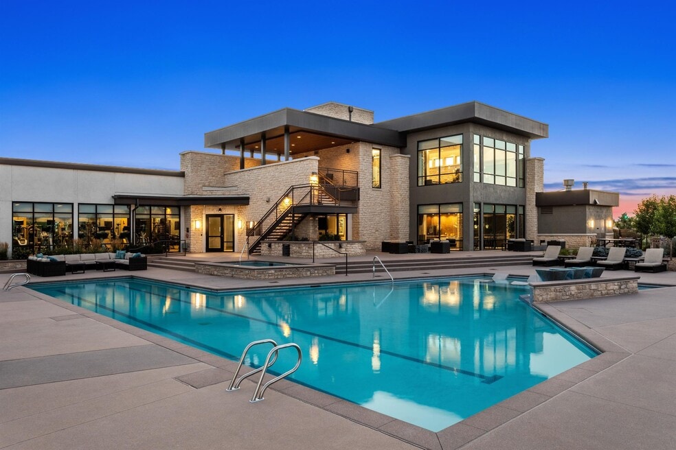 Resort-Style Pool with Expansive Sundeck and Modern Clubhouse