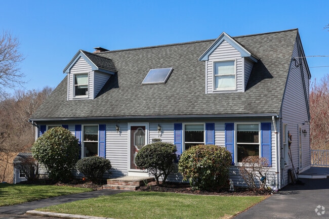 New England style Cape Cod homes are a prominent feature throughout the Castle Hill neighborhood, adding a timeless, charm to the area.