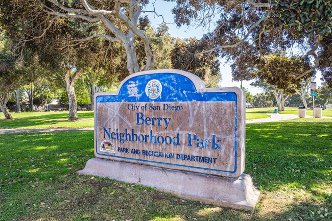 Berry Neighborhood Park serves as a green space with a few picnic benches.