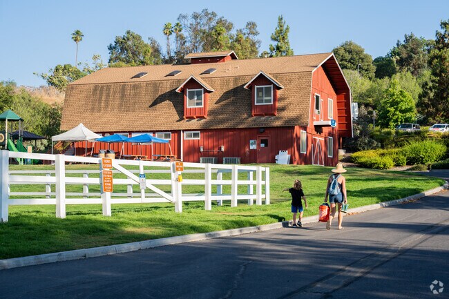 The local Jacks Pond park has many hiking trails for families to enjoy in Village O San Marcos.