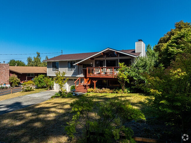 This gorgeous split-level home is a jewel on its street.
