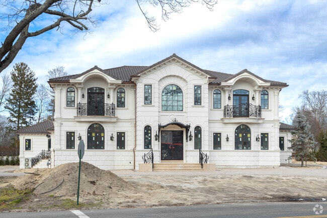 Some residents of Hewlett Bay Park have taken down the original homes and are rebuilding larger.