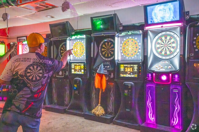 Become a regular at The Windmill in North Wheeling and enjoy food and drinks as you play darts.