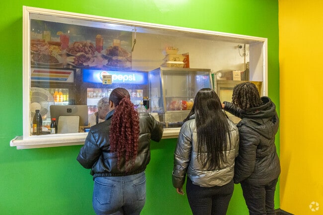 Indulge in the vibrant flavors of the Caribbean at All Star Caribbean Restaurant on Maple Ave.