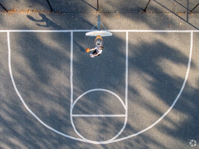 Practice basketball at 6th Ward Park in Lancaster with a well-maintaned court.