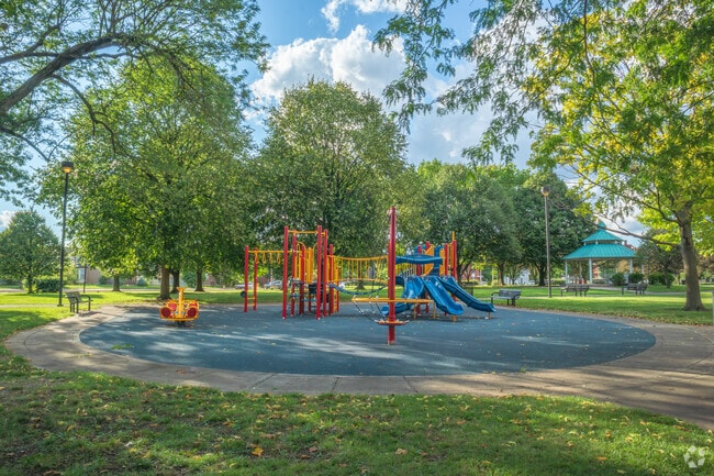 Mayme Moore Park near South of Main features a playground for children.