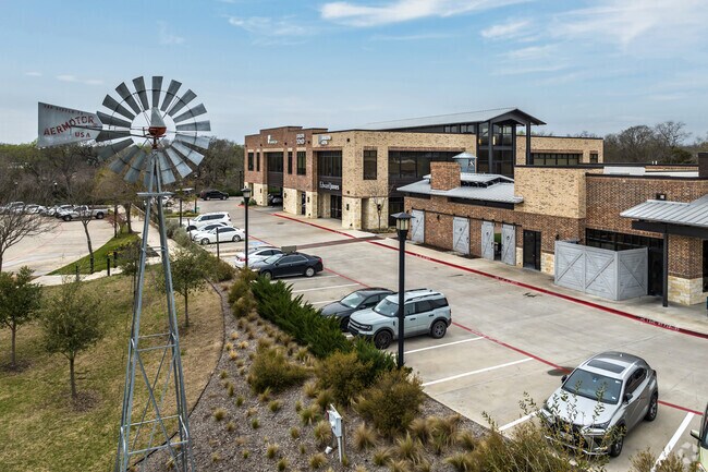 A windmill oversees some of the retail shops that Sunnyvale has to offer.
