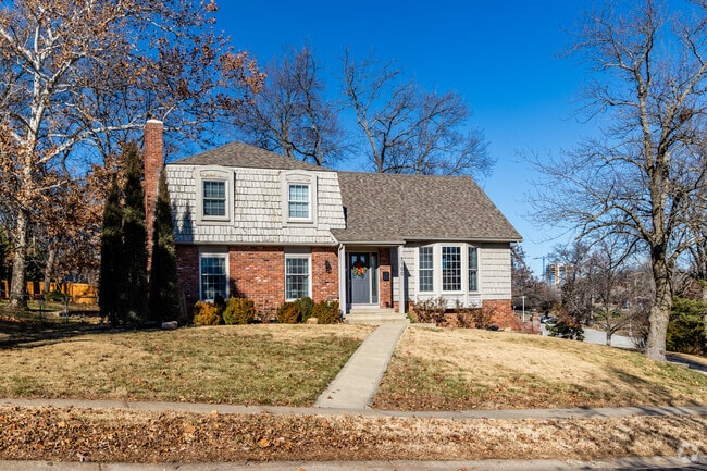 Tudor-style homes in Pinehurst commonly include brick and shingle exteriors.