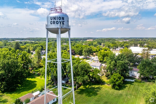 Union Grove’s signature water tower rises above surrounding parks, homes, and rural landscapes.