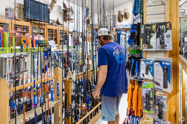Frisco locals shop for their tackle needs at the Rod & Gun in the Frisco Shopping Center.