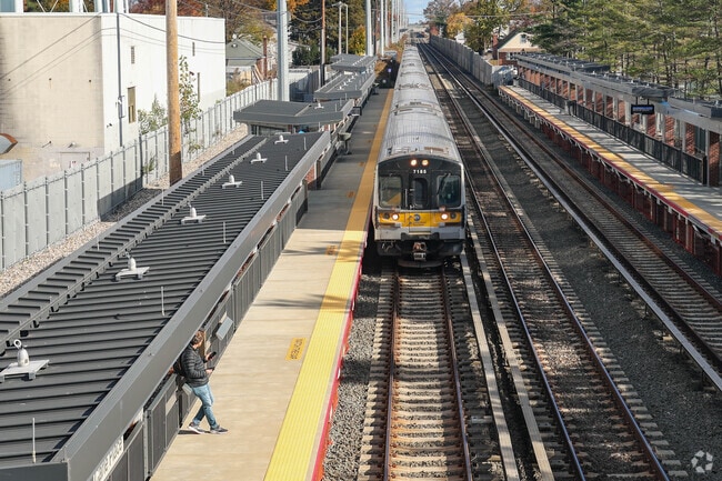 The trip to NYC is relatively quick from the nearby Carle place LIRR station.