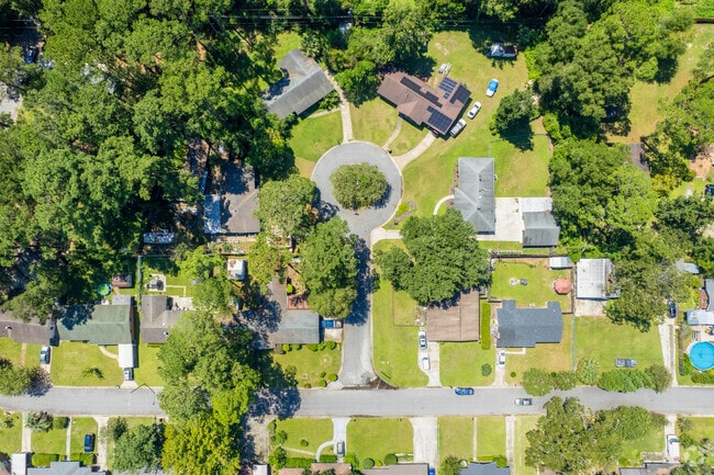 Oakhurst homes are set along wide, tree lined streets.