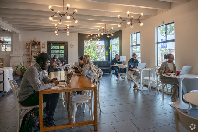 Savor a fresh coffee or natural wine, browse locally crafted goods at Communal Coffee.