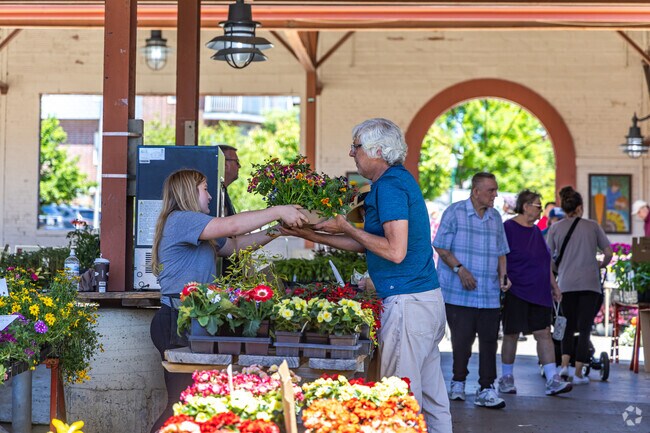 Rainbow Gardens residents fill their gardens with flowers from the West Allis Farmer's Market.