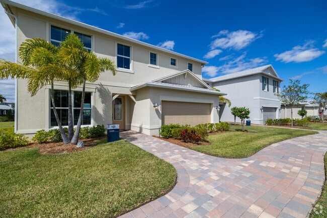 Row of 2 story homes in Dell Webb Tradition subdivision a 55+ community.