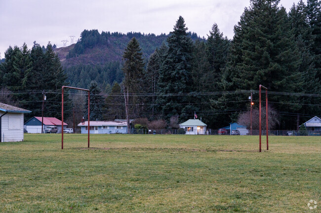 A mini football field sits next to the playground