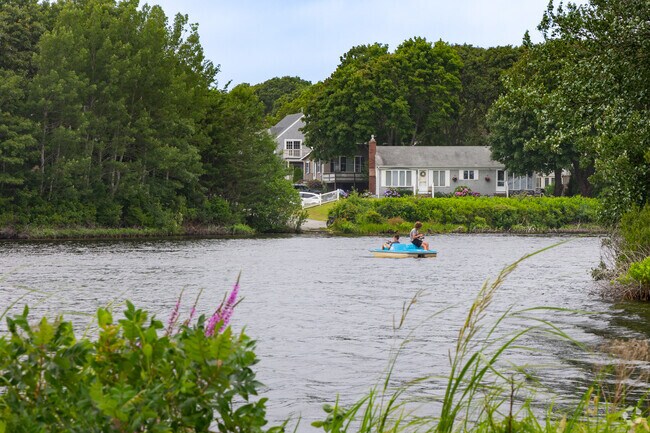 Kids enjoy a lazy afternoon fishing Dean's Pond in Popponesset.