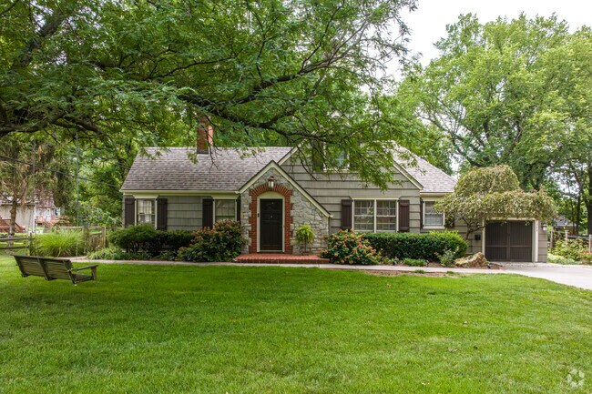Large mature trees shade the houses in Downtown Overland Park.