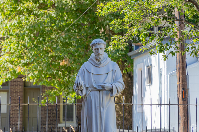 There is a St Boniface statue in the pocket garden for the kids to enjoy, in Lafayette.
