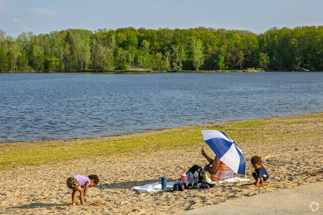 A sandy beachfront at Bluebell Beach has plenty of space for local kids to build sand castles.
