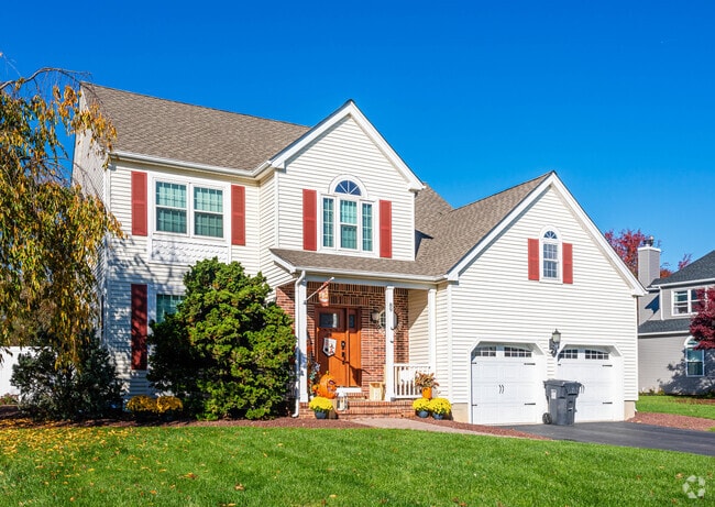 Here is a center hall Colonial home with a well manicured lawn in Harmony Township, NJ.
