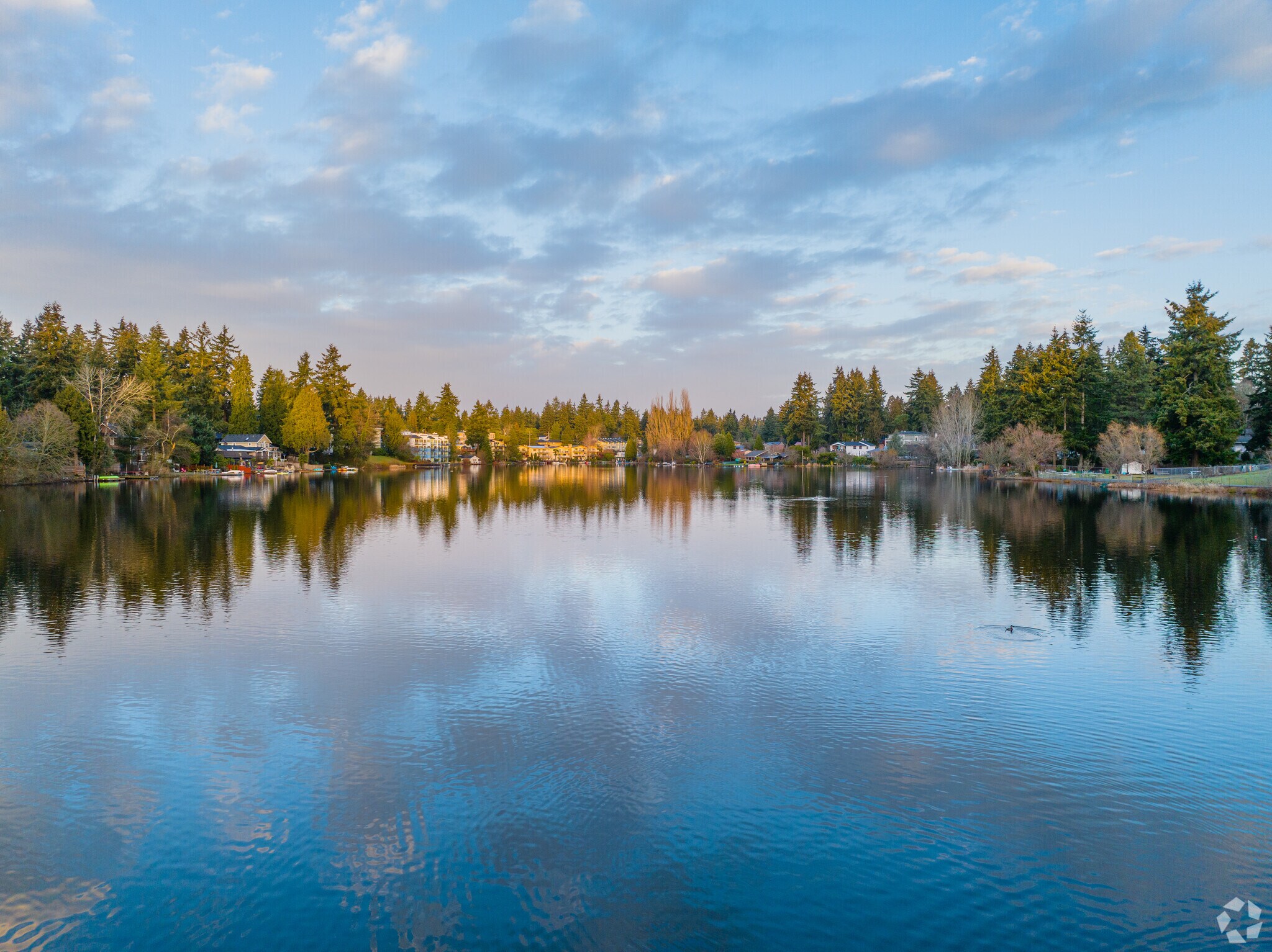 Homes, condos, and parks line the shores of Bitter Lake in Seattle.