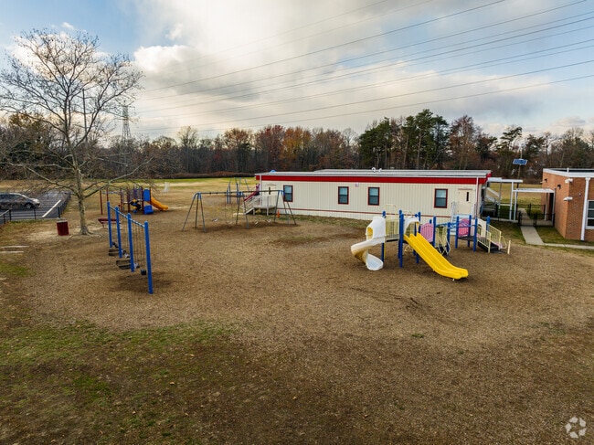 The New Albany Elementary playground is a hub of laughter, friendship, and active imagination.