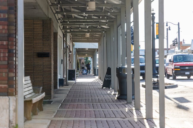 Much of the broad sidewalks of Downtown Hartselle are covered, providing shade from the intense Alabama Summer sun.