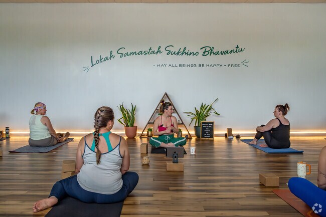 Holy Trinity Longfellow residents can stay active at Palm + Pine Yoga Studio and School.