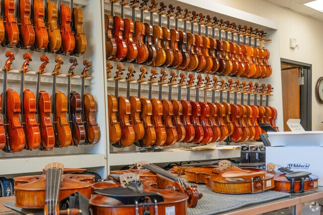 Behold the magnificent display of string instruments at Brobst Violin Shop in Bren Mar Park VA.