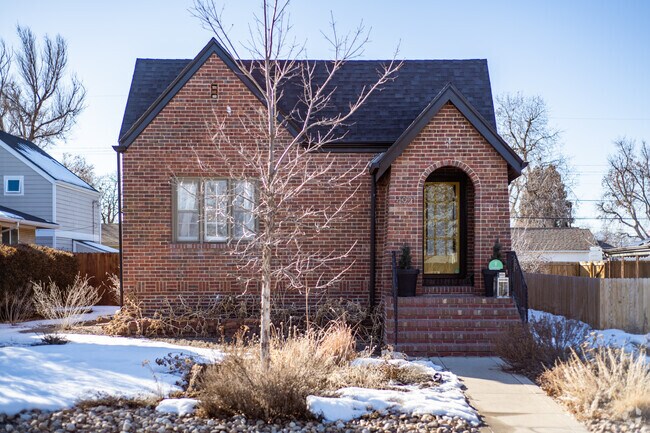 Architectural accents give character to this brick bungalow in Chaffee Park.