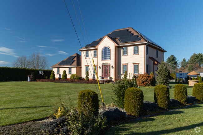 Homes feature beautifully manicured lawns in Upper Acushnet.