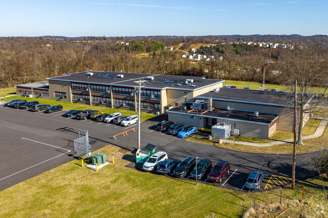University Park Elementary School includes a large looped road for traffic management.