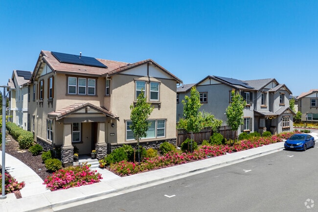 Uniform home styles create a visually appealing neighborhood in Eden Shores.