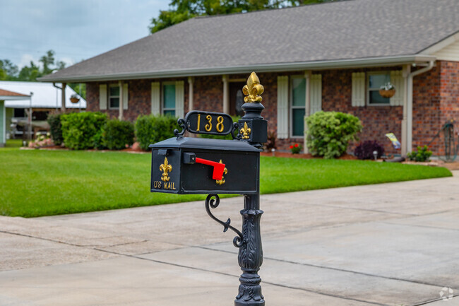 Residents in the Montz neighborhood have their own stylized mail boxes.