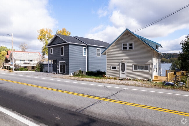 Conesus Lake homes often add back decks for lakefront living.