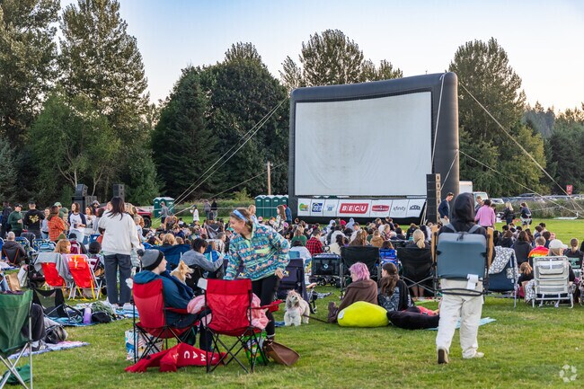 Southeast Redmond residents gather for the weekly Outdoor Movies at Marymoor Park.