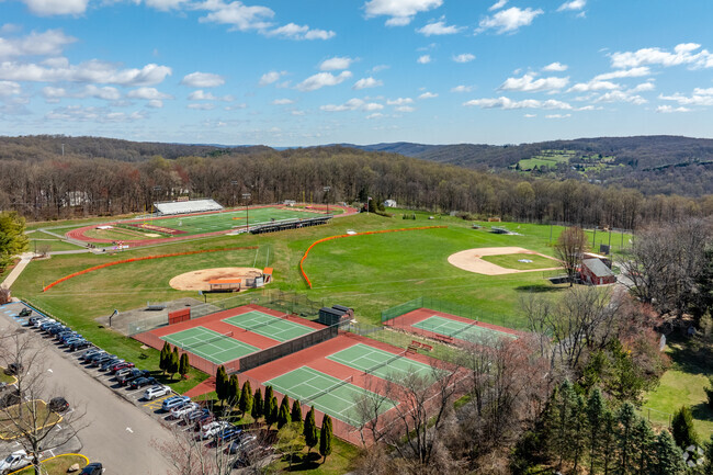 Voorhees High School features athletic fields and courts instead of a traditional playground.